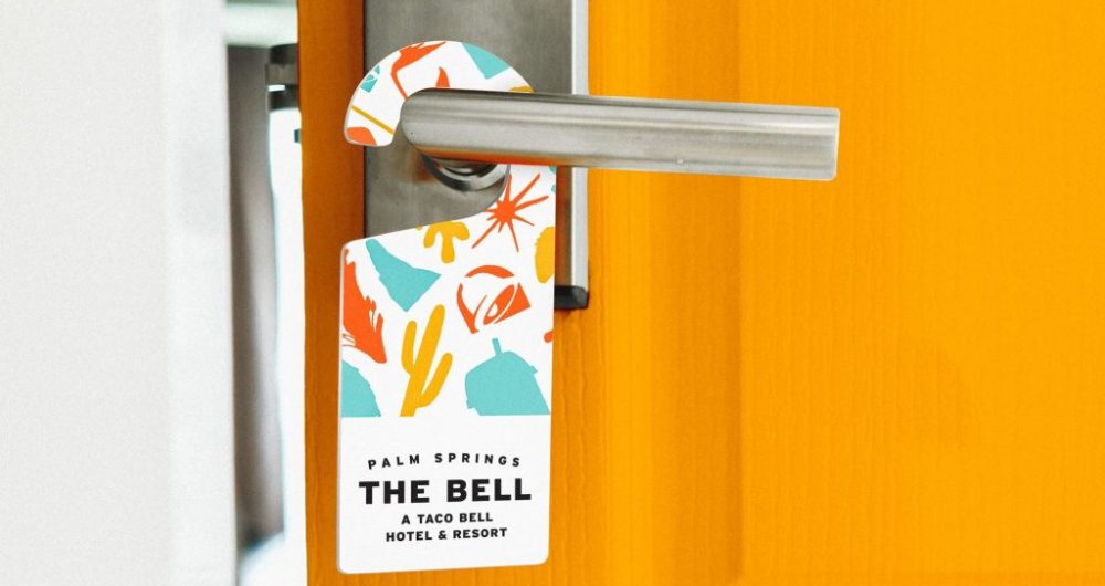 The-Bell_-A-Taco-Bell-Hotel-and-Resort-Door-Hanger--e1558037693695