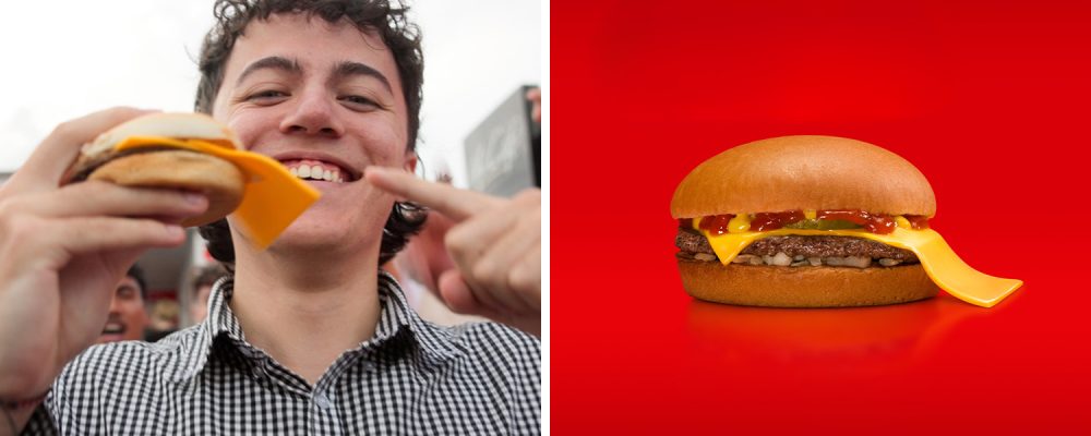 heroooooMcMullet-holding-burger.0Em4iKNK