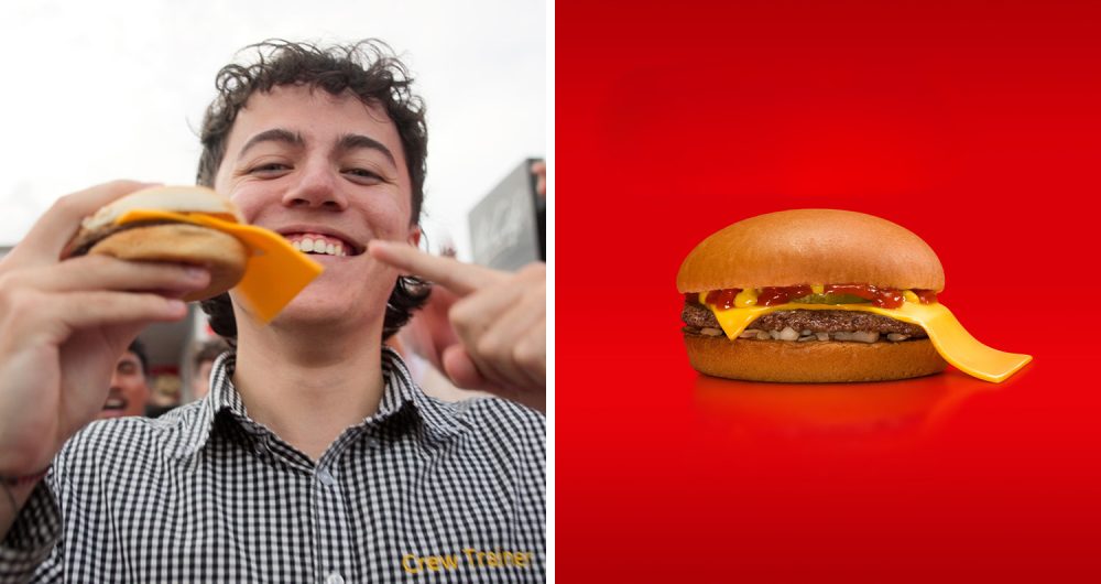 heroooooMcMullet-holding-burger.0Em4iKNK